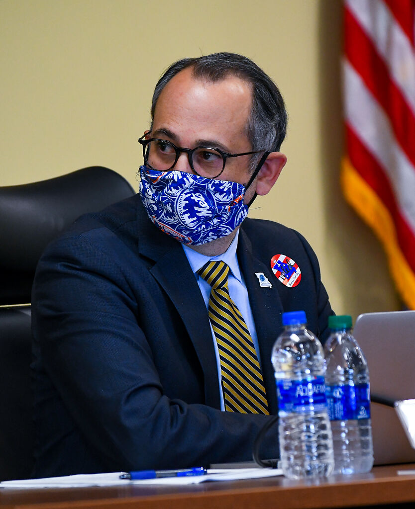 Peter Stieplement sits Tuesday at a Columbia School Board meeting